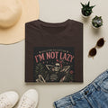 T-Shirt — “I’m Not Lazy, I’m Aggressively Relaxing” Skeleton Graphic Tee