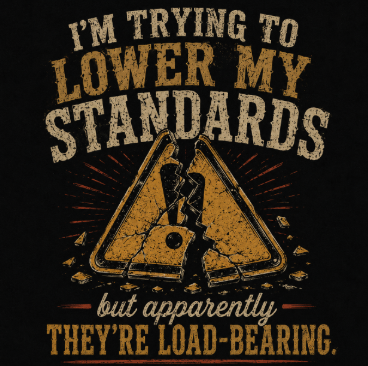 T-Shirt — “I’m Trying to Lower My Standards (But Apparently They’re Load‑Bearing)” Funny Graphic Tee
